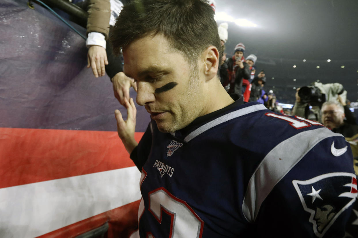 Tom Brady doesn't owe New England anything. That said, it's hard not to wonder where his head was during a 2019 season that was rough by his lofty standards — and during which we now know he was being actively recruited by the Miami Dolphins. (AP Photo/Bill Sikes, File)