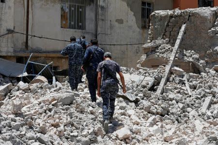 Members of the Iraqi Federal Police are seen on the frontline in the Old City of Mosul, Iraq June 28, 2017. REUTERS/Ahmed Jadallah