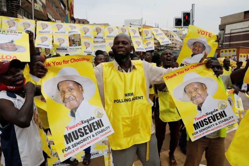 Supporters of Uganda's President Yoweri Museveni celebrate the announcement of him winning the presidential elections, in Kampala