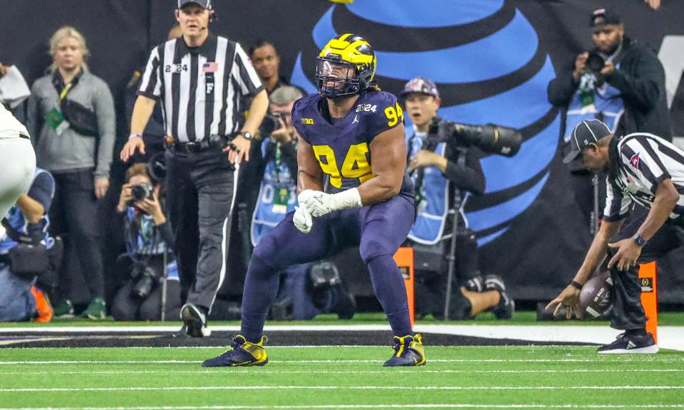 The Bengals picked Michigan defensive tackle Kris Jenkins in the second round of the NFL draft on Friday.