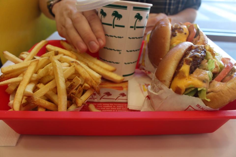 A tray of burgers and fries at In-N-Out in San Francisco, CA. Photo by Caitlyn Heter