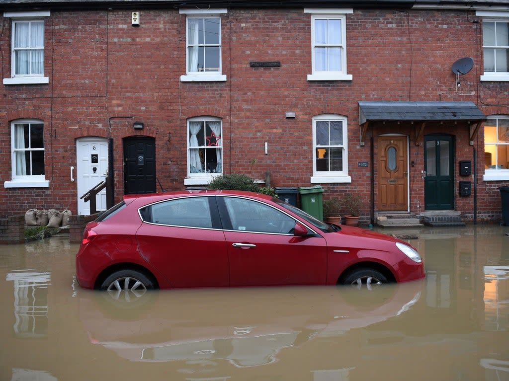 Climate crisis is worsening the flood risk in the UK, the Environment Agency has warned (AFP via Getty Images)