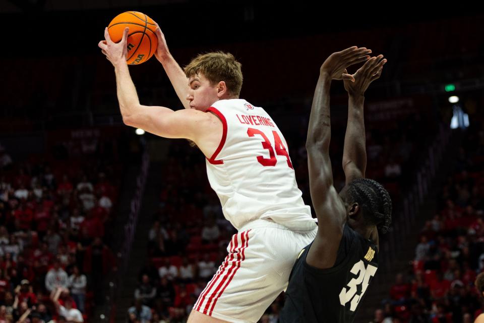 Utah Utes center Lawson Lovering (34) catches the ball with Colorado Buffaloes forward Assane Diop (35) on defense during the men’s college basketball game between the Utah Utes and the Colorado Buffaloes at the Jon M. Huntsman Center in Salt Lake City on Saturday, Feb. 3, 2024. | Megan Nielsen, Deseret News