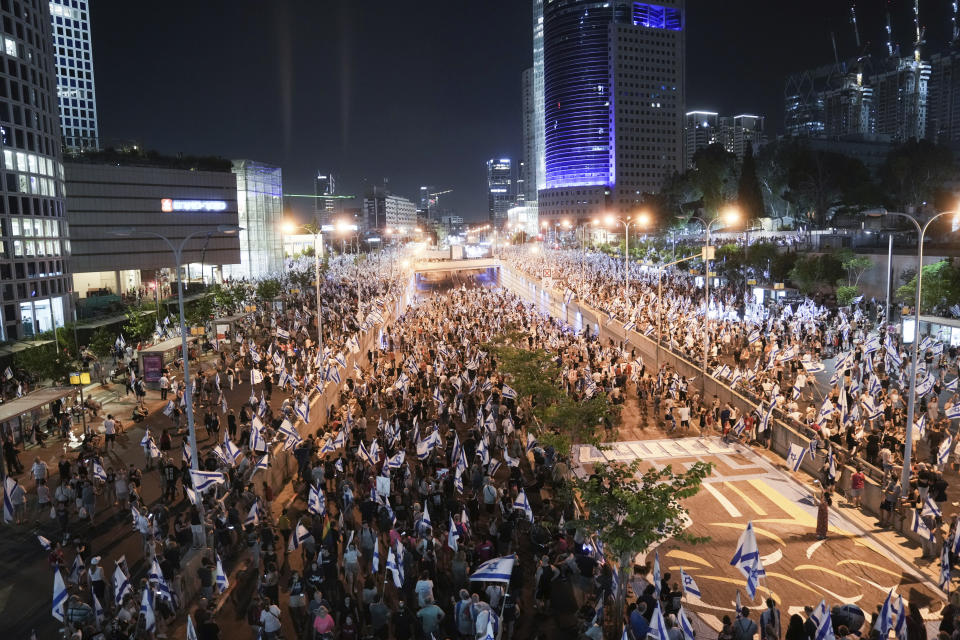 Israelis protest against plans by Prime Minister Benjamin Netanyahu's government to overhaul the judicial system, in Tel Aviv, Israel, Saturday, July 22, 2023. (AP Photo/Mahmoud Illean)