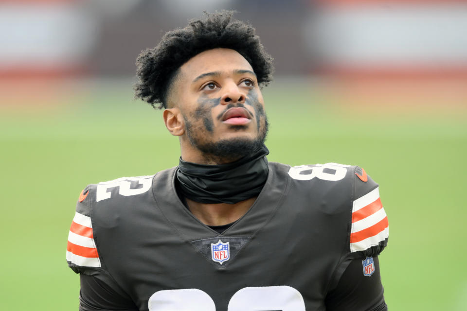 FILE - Cleveland Browns wide receiver Rashard Higgins warms up before an NFL football game against the Pittsburgh Steelers in Cleveland, in this Sunday, Jan. 3, 2021, file photo. Rashard Higgins moved on from his critical game-swinging play. He couldn't leave the Browns. Higgins recently turned down more money in free agency from other teams and signed a one-year, $2.3 million contract to stay with Cleveland. "I knew where I wanted to be,” the wide receiver said Friday, March 26, 2021, on a Zoom call while sitting in his car at the team's facility in Berea, Ohio. (AP Photo/David Richard, File)