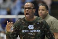 North Carolina head coach Hubert Davis directs his team during the first half of an NCAA college basketball game against Brown in Chapel Hill, N.C., Friday, Nov. 12, 2021. (AP Photo/Gerry Broome)