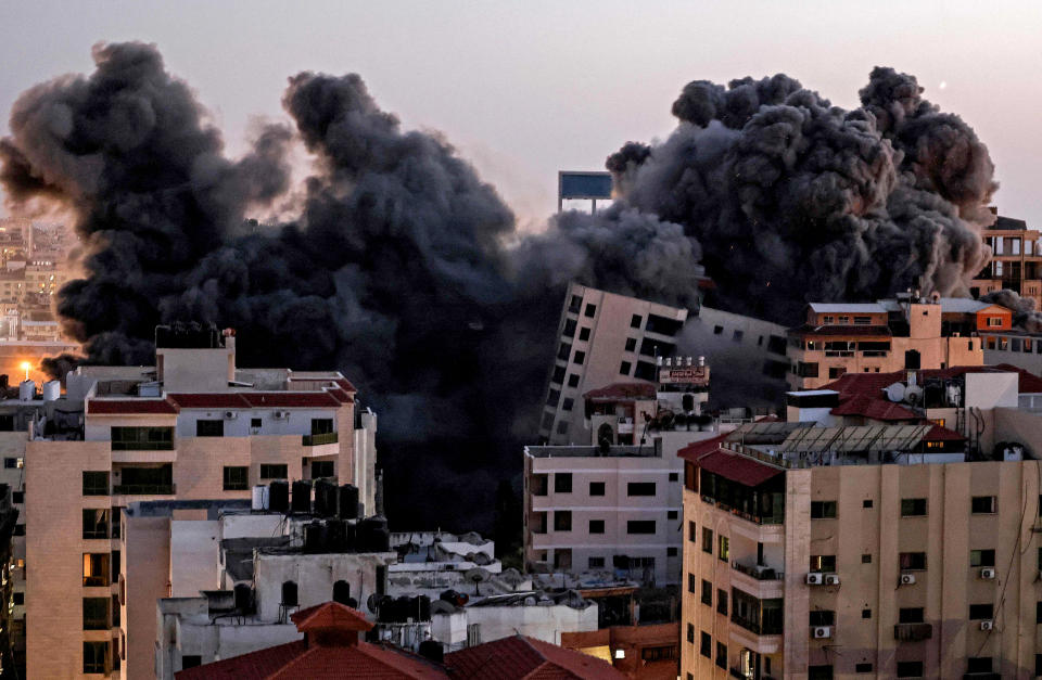 Image: Smoke billows from an Israeli air strike on the Hanadi compound in Gaza City, controlled by the Palestinian Hamas movement, on May 11, 2021. (Mahmud Hams / AFP - Getty Images)