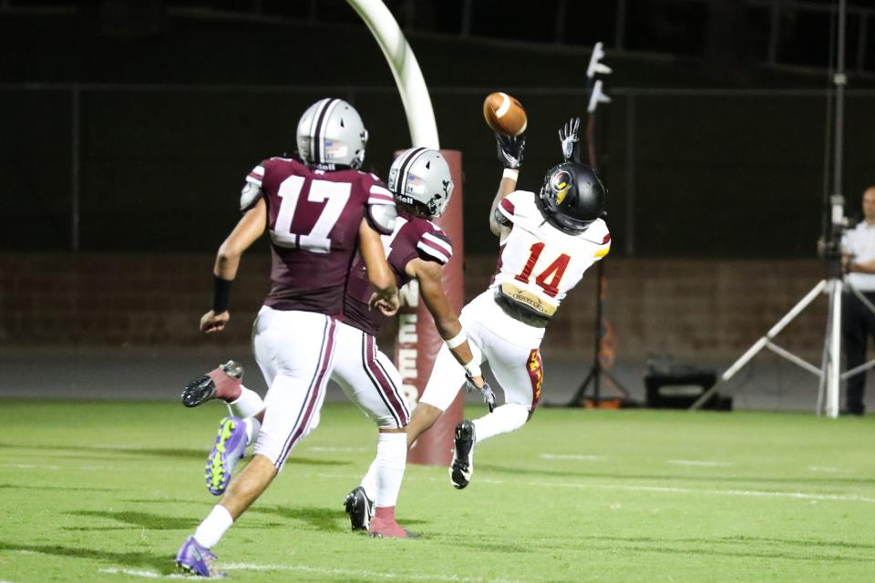 Tulare Union's Franklin Lockard catches a TD against Mt. Whitney in a non-league high school football game at Mineral King Bowl on August 18th, 2023.