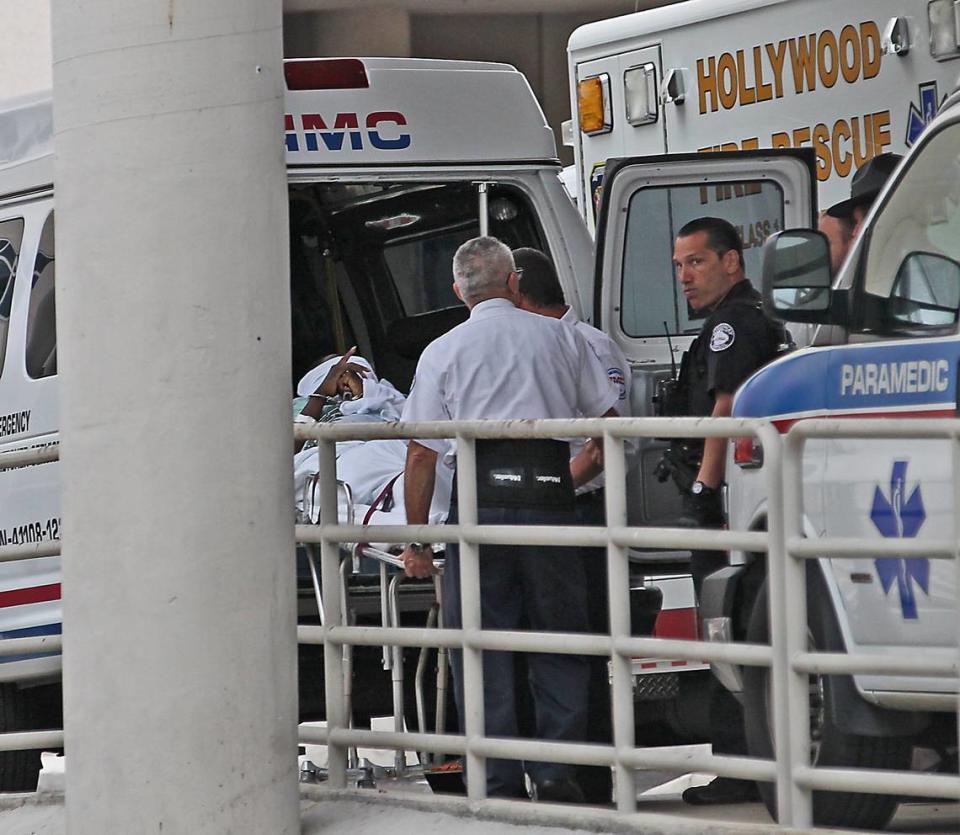 The Florida Highway Patrol arrested suspect Willie Dumel at Memorial Regional Hospital in Hollywood and transported him by ambulance to the Miami-Dade County Jail on Wednesday, May 1, 2013.