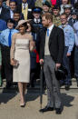 <p>She accessorised with a large-brimmed hat from Philip Treacy tilted to the side, with her hair styled in a low bun. Photo: Getty </p>