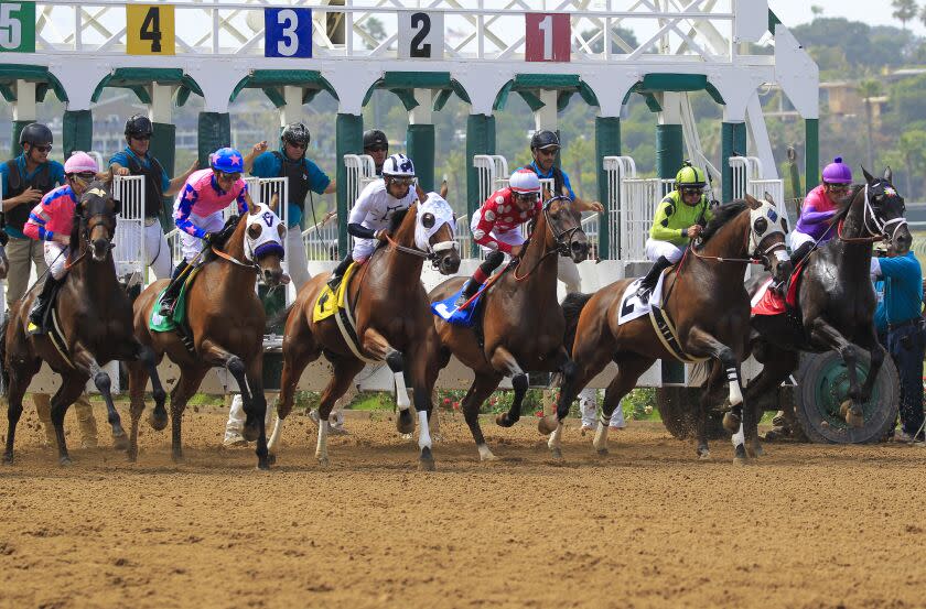 Horses come out of the starting gate Wednesday on opening day at Del Mar. On Aug. 12, 2019.