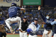 Tampa Bay Rays' Brett Phillips (35) celebrates with teammates after hitting a three-run home run against the Detroit Tigers during the 10th inning of a baseball game Friday, Sept. 17, 2021, in St. Petersburg, Fla. (AP Photo/Scott Audette)