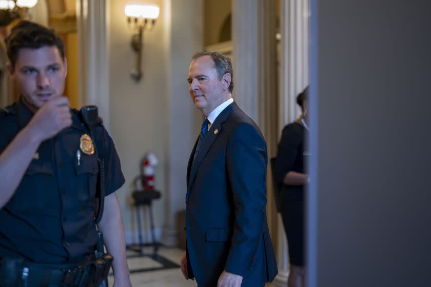 Rep. Adam Schiff, D-Calif., center, one of the most outspoken critics of former President Donald Trump, stands outside the chamber after the Republican-controlled House voted along party lines to censure him for comments he made several years ago about investigations into Trump's ties to Russia, at the Capitol in Washington, Wednesday, June 21, 2023. (AP Photo/J. Scott Applewhite)