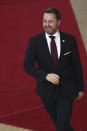 Luxembourg's Prime Minister Xavier Bettel arrives for an EU summit in Brussels, Friday, Dec. 13, 2019. European Union leaders are gathering Friday to discuss Britain's departure from the bloc amid some relief that Prime Minister Boris Johnson has secured an election majority that should allow him to push the Brexit deal through parliament. (AP Photo/Francisco Seco)