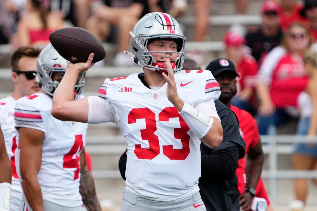 Sep 2, 2023; Bloomington, Indiana, USA; quarterback Devin Brown (33) warms up prior to the NCAA football game at Indiana University Memorial Stadium. Ohio State won 23-3.