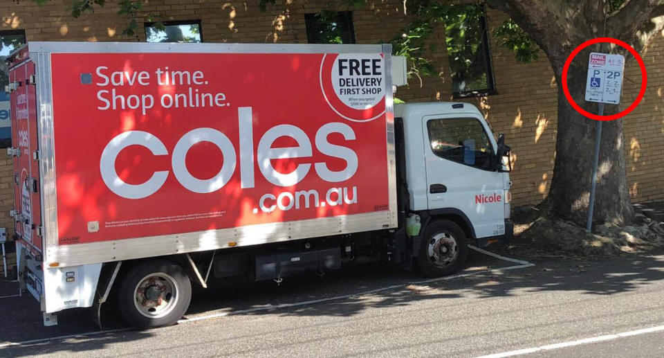 Coles delivery truck parked on Melbourne street. 