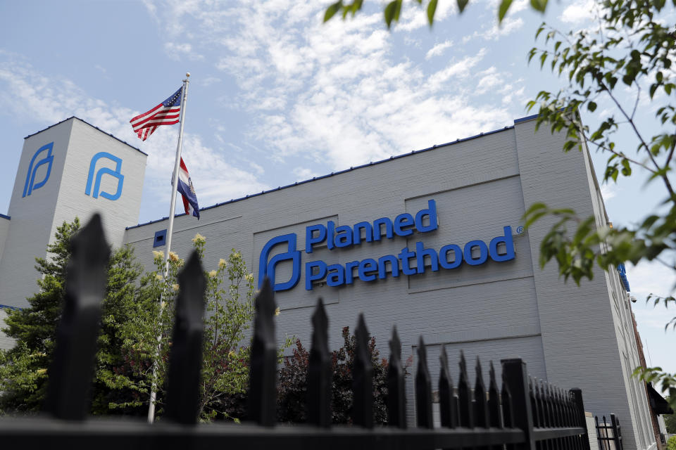 FILE- In this June 4, 2019, file photo, a Planned Parenthood clinic is photographed in St. Louis. Planned Parenthood says it will leave the federal family planning program by Monday, Aug. 19, unless a court puts a hold on Trump administration rules that bar clinics from referring women for abortions. (AP Photo/Jeff Roberson, File)