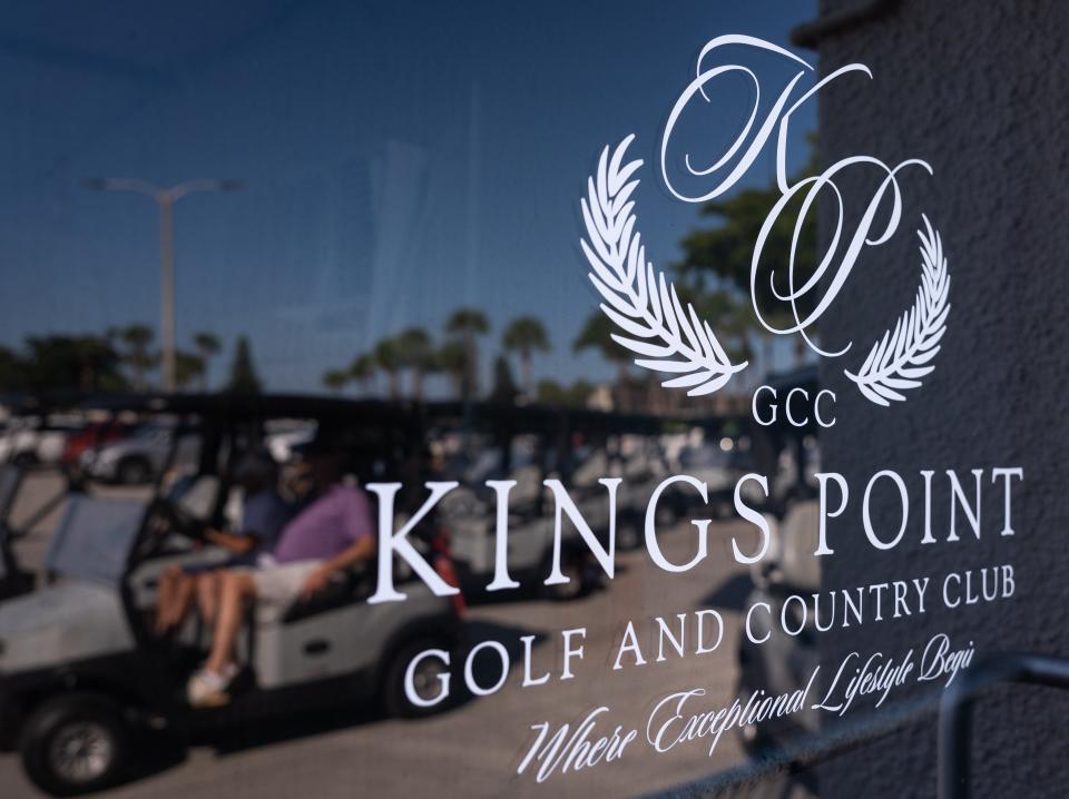 A golfer drives a golf cart past a line of carts parked at the King's Point Golf and Country Club clubhouse on Monday, December 5, 2022, in Delray Beach, FL. Just over two months after a tornado spawned by the eastern bands of September's Hurricane Ian ravaged the 55+ community of King's Point, the community's golf course has re-opened for golfers to once again enjoy.