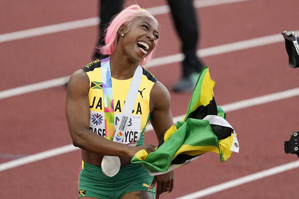 Silver medalist Shelly-Ann Fraser-Pryce, of Jamaica celebrates after the final of the women's 200-meter run at the World Athletics Championships on Thursday, July 21, 2022, in Eugene, Ore. (AP Photo/Gregory Bull)