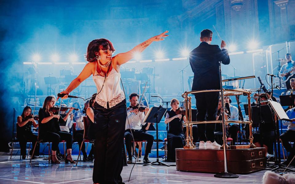 Raye performs at the Royal Albert Hall with the 50-piece Heritage Orchestra