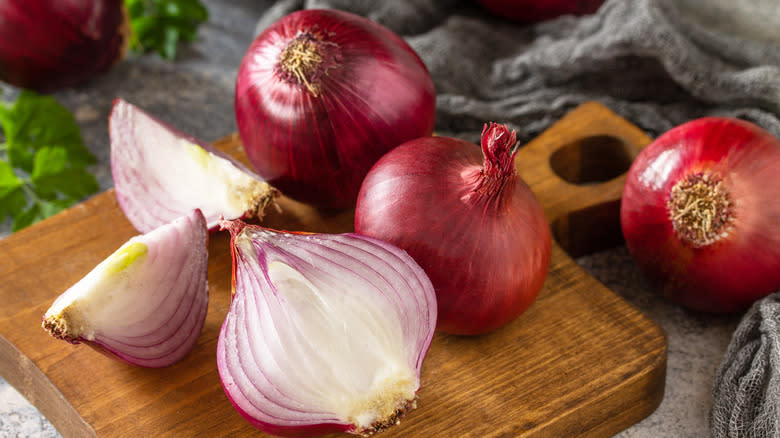 whole and sliced purple onions