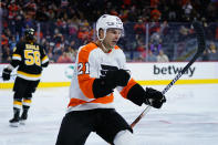 Philadelphia Flyers' Scott Laughton celebrates after scoring a goal during the second period of an NHL hockey game against the Boston Bruins, Wednesday, Oct. 20, 2021, in Philadelphia. (AP Photo/Matt Slocum)