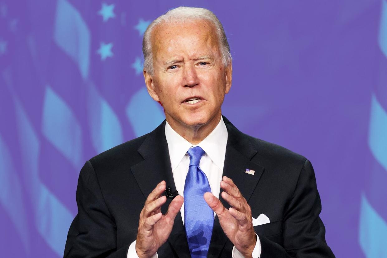 Biden-Will-Require-Vaccine-Mandates-For-Companies-With-Over-100-Employees-GettyImages-1267438518