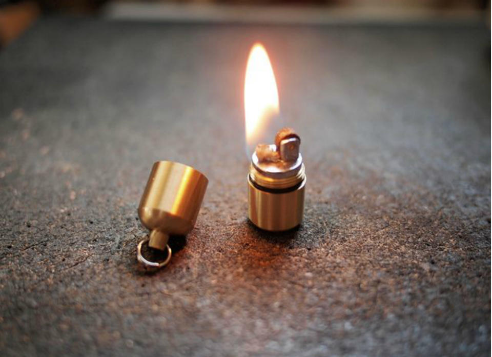 <body><p>This minuscule waterproof lighter can create a blaze for you in an instant. Like larger lighters of its ilk, it relies on a flint and lighter fluid (which you'll need to replenish as needed). Simply roll the wheel, and you have a reliable flame to light some kindling—or candles, if that's what the situation calls for. <em>Available at <a rel="nofollow noopener" href=" http://www.countycomm.com/splitpea.html" target="_blank" data-ylk="slk:CountyComm;elm:context_link;itc:0;sec:content-canvas" class="link ">CountyComm</a>; $14.50.</em> </p></body>