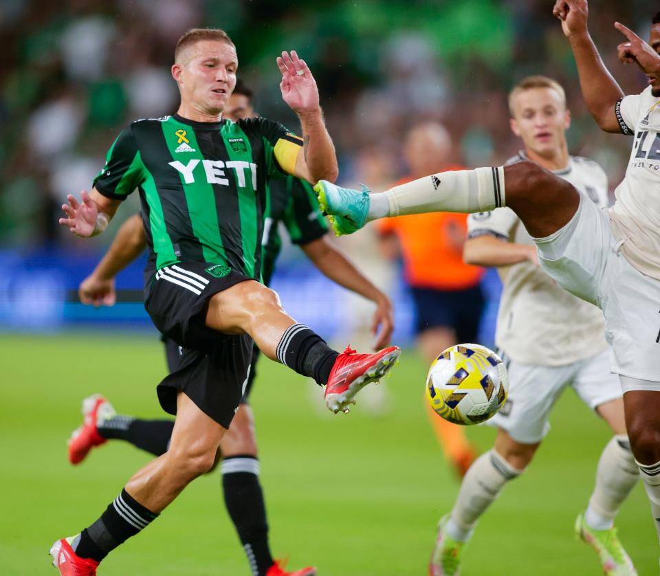 Sep 15, 2021; Austin, Texas, USA; Austin FC midfielder Alex Ring (8) makes a shot on goal against Los Angeles FC during the second half at Q2 Stadium.