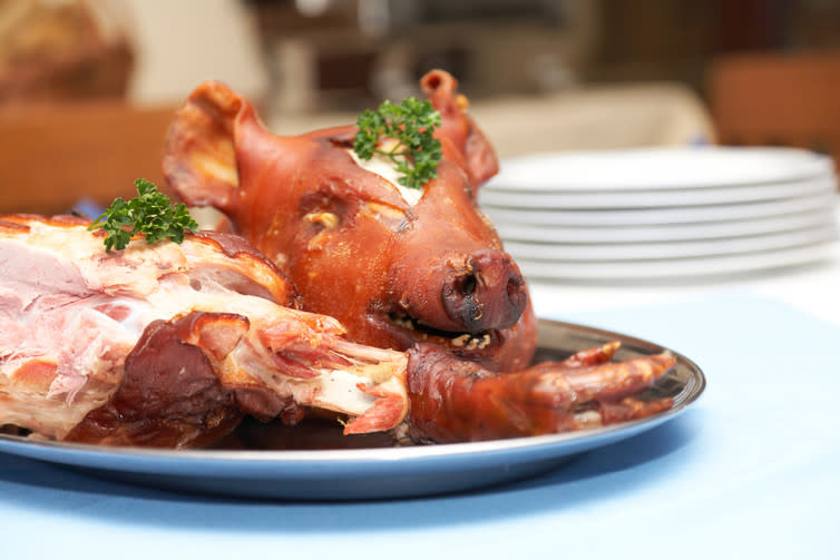 <span class="caption">Anyone for a roasted pig ear?</span> <span class="attribution"><a class="link " href="https://www.shutterstock.com/image-photo/roasted-pig-head-26035657?src=z9vJ8CcyIGneAESE6ncgIg-1-40" rel="nofollow noopener" target="_blank" data-ylk="slk:Natalya Hora/Shutterstock;elm:context_link;itc:0;sec:content-canvas">Natalya Hora/Shutterstock</a></span>