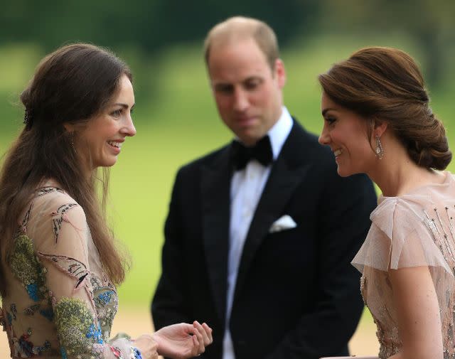 HRH Prince William and Catherine, Princess of Wales are greeted by Rose Cholmondeley, the Marchioness of Cholmondeley. Photo by Stephen Pond/Getty Images.