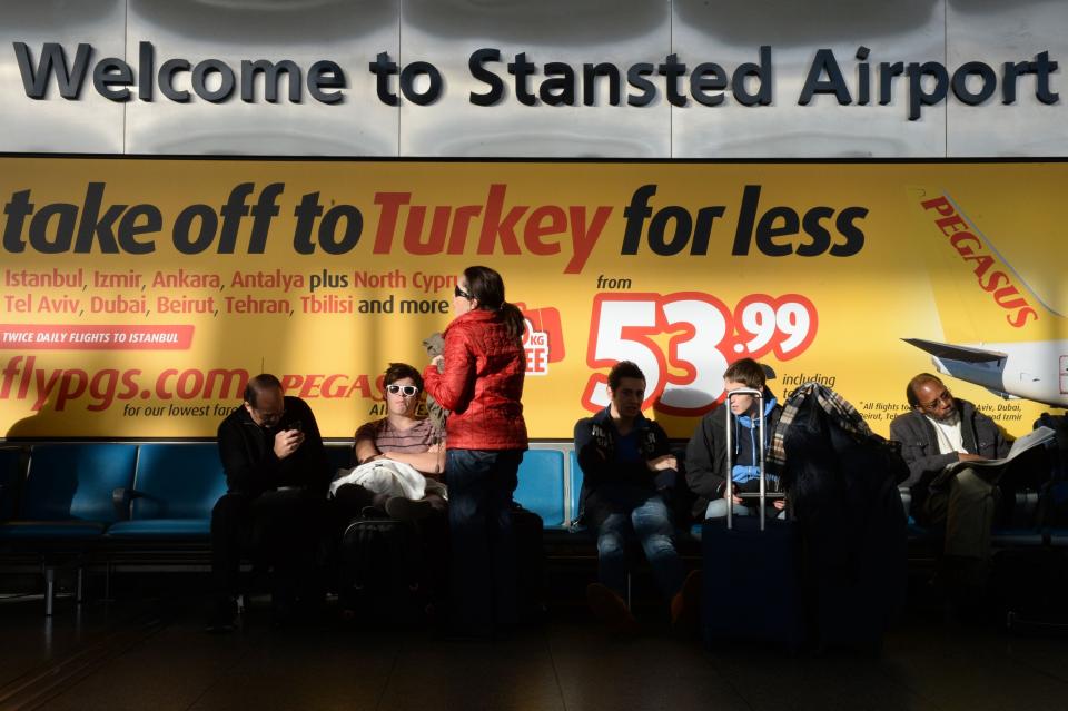 passengers waiting at Stansted Airport, Essex, as a power failure has affected a major holiday airport as travellers move off for the Christmas holidays.