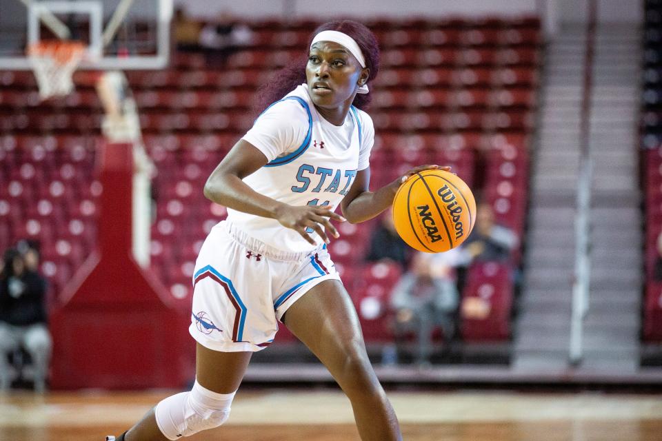 NMSU guard Soufia Inoussa looks for a teammate to pass the ball to during a women's basketball game on Thursday, Jan. 26, 2023, at the Pan American Center.