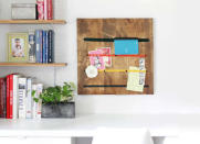 <p>Inspired by the work of Dutch painter Evert Collier, this clever craft repurposes old garment belts into a modern memo board. It’s assembled simply, using two wood planks strung horizontally with belts. Mount the plank to the wall with picture-hanging hardware to keep your <a href="http://www.bobvila.com/slideshow/10-inventive-ways-to-display-family-photos-49217" rel="nofollow noopener" target="_blank" data-ylk="slk:photos;elm:context_link;itc:0;sec:content-canvas" class="link ">photos</a>, notes, and reminders within easy reach. <i>Photo: <a href="http://www.abeautifulmess.com/2014/07/make-this-belt-strap-memo-board-1.html" rel="nofollow noopener" target="_blank" data-ylk="slk:abeautifulmess.com;elm:context_link;itc:0;sec:content-canvas" class="link ">abeautifulmess.com</a><br></i><b>RELATED: <a href="http://www.bobvila.com/slideshow/10-space-smart-ways-to-squeeze-in-a-home-office-48561" rel="nofollow noopener" target="_blank" data-ylk="slk:10 Space-Smart Ways to Squeeze In a Home Office;elm:context_link;itc:0;sec:content-canvas" class="link ">10 Space-Smart Ways to Squeeze In a Home Office</a></b></p>