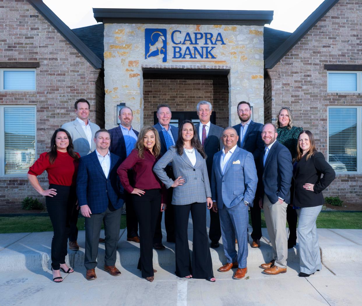 Capra Bank leadership stands outside the new Lubbock location at 7710 Milwaukee Ave, Suite 400.