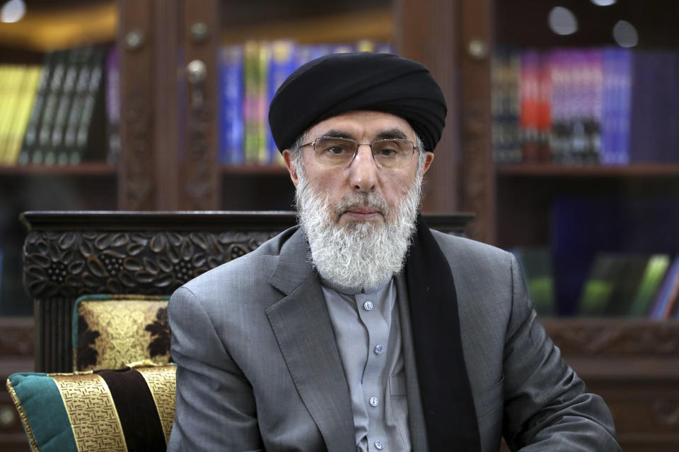 In this Sunday, Sept. 22, 2019 photo, Gulbuddin Hekmatyar, a candidate in Afghanistan's upcoming presidential election, poses for a photo after an interview in his home in Kabul, Afghanistan. While there will be 18 names on the presidential ballot when Afghans go to the polls on Sept. 28 only five, including Hekmatyar, have been campaigning after several suspended their campaigns believing a peace deal with the Taliban was imminent. (AP Photo/Ebrahim Noroozi)