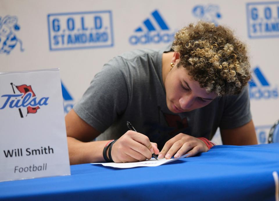 Choctaw outside linebacker Will Smith signs with the University of Tulsa on Wednesday.