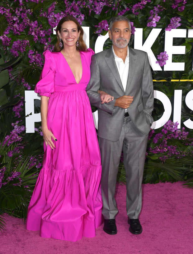 LOS ANGELES, CALIFORNIA - OCTOBER 17: Julia Roberts and George Clooney arrives at the Premiere Of Universal Pictures' "Ticket To Paradise" at Regency Village Theatre on <a href="https://parade.com/living/october-holidays-observances/" rel="nofollow noopener" target="_blank" data-ylk="slk:October;elm:context_link;itc:0;sec:content-canvas" class="link ">October</a> 17, 2022 in Los Angeles, California. (Photo by Steve Granitz/FilmMagic)<p><a href="https://www.gettyimages.com/detail/1434292502" rel="nofollow noopener" target="_blank" data-ylk="slk:Steve Granitz/Getty Images;elm:context_link;itc:0;sec:content-canvas" class="link ">Steve Granitz/Getty Images</a></p>