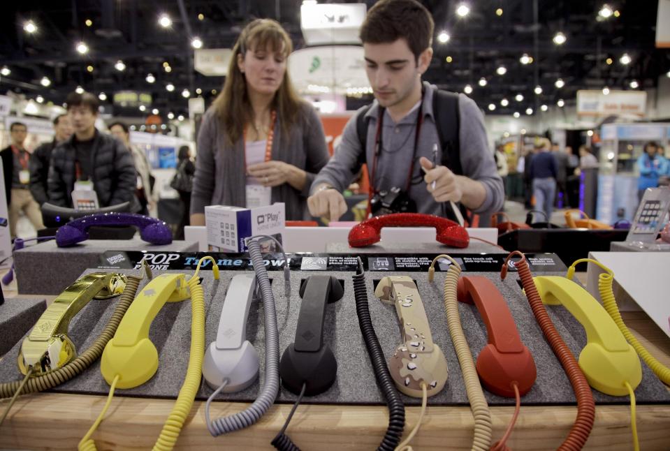 Cell phone hand sets are seen on display at the 2012 International Consumer Electronics show, Friday, Jan. 13, 2012, in Las Vegas. As Thursday, Feb. 22, 2024, cell phone outage shows, sometimes landline telephones can come in handy, and were suggested as part of the alternatives when people's cell phones weren't working. (AP Photo/Julie Jacobson)