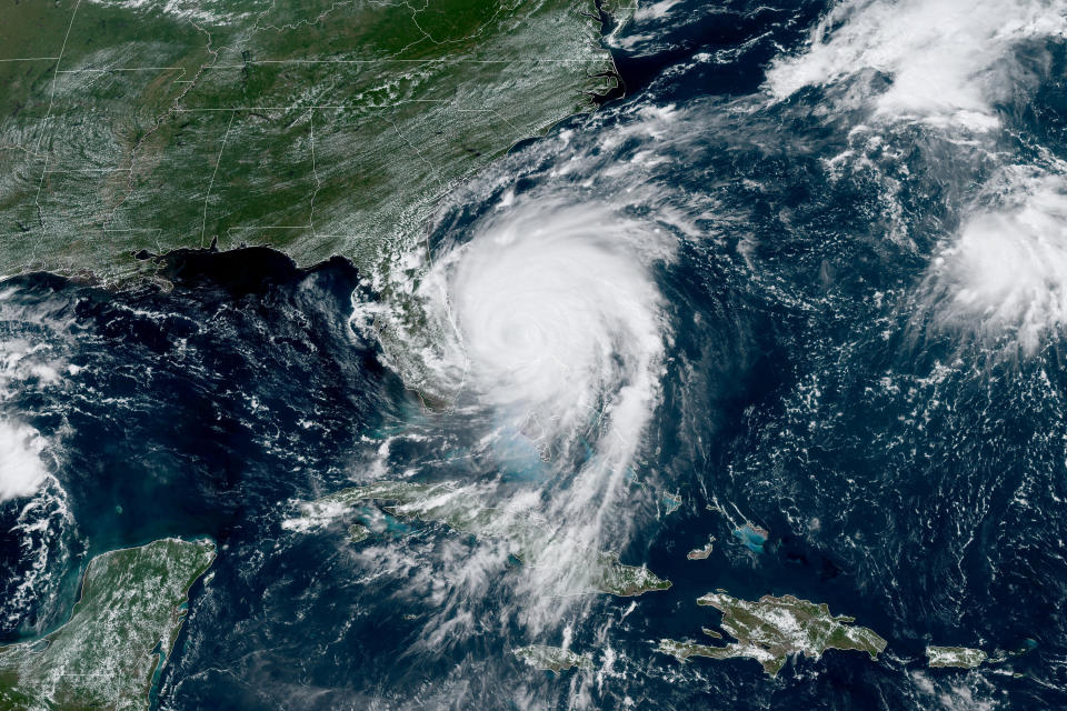 Hurricane Dorian&nbsp;inches northwest away from the Bahamas as a Category 2 storm in this satellite image from the National Oceanic and Atmospheric Administration, taken Tuesday, Sept. 3.