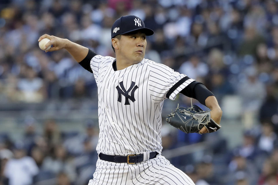 New York Yankees starting pitcher Masahiro Tanaka delivers against the Minnesota Twins during the first inning of Game 2 of an American League Division Series baseball game, Saturday, Oct. 5, 2019, in New York. (AP Photo/Frank Franklin II)