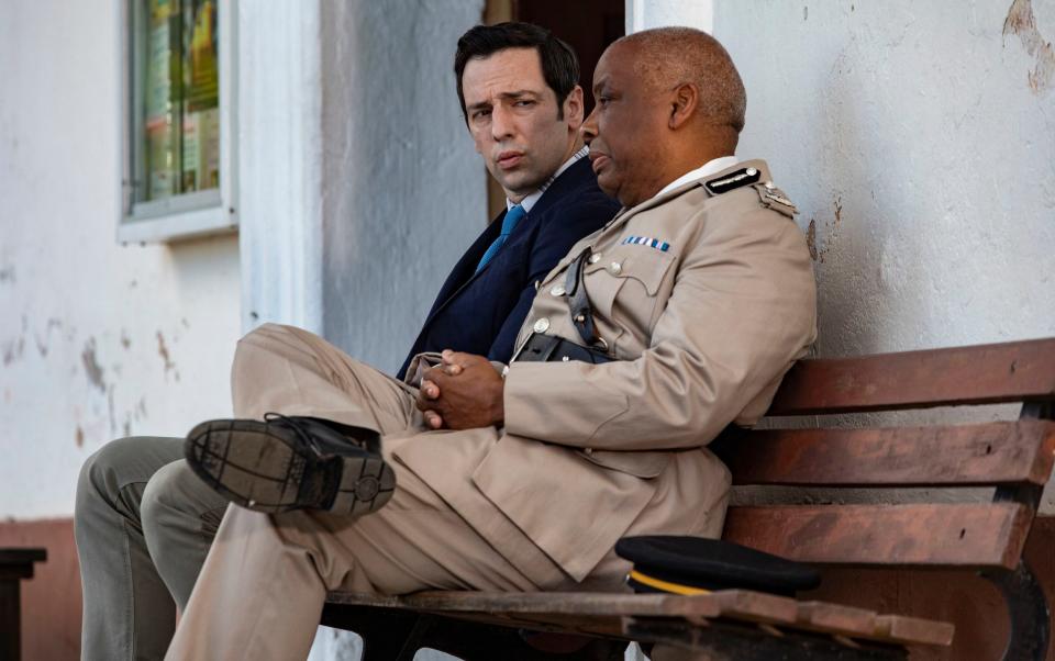 Don Warrington returns as Commissioner Selwyn Patterson with Ralf Little as DI Neville Parker for this year's Death in Paradise Christmas special - Denis Guyenon