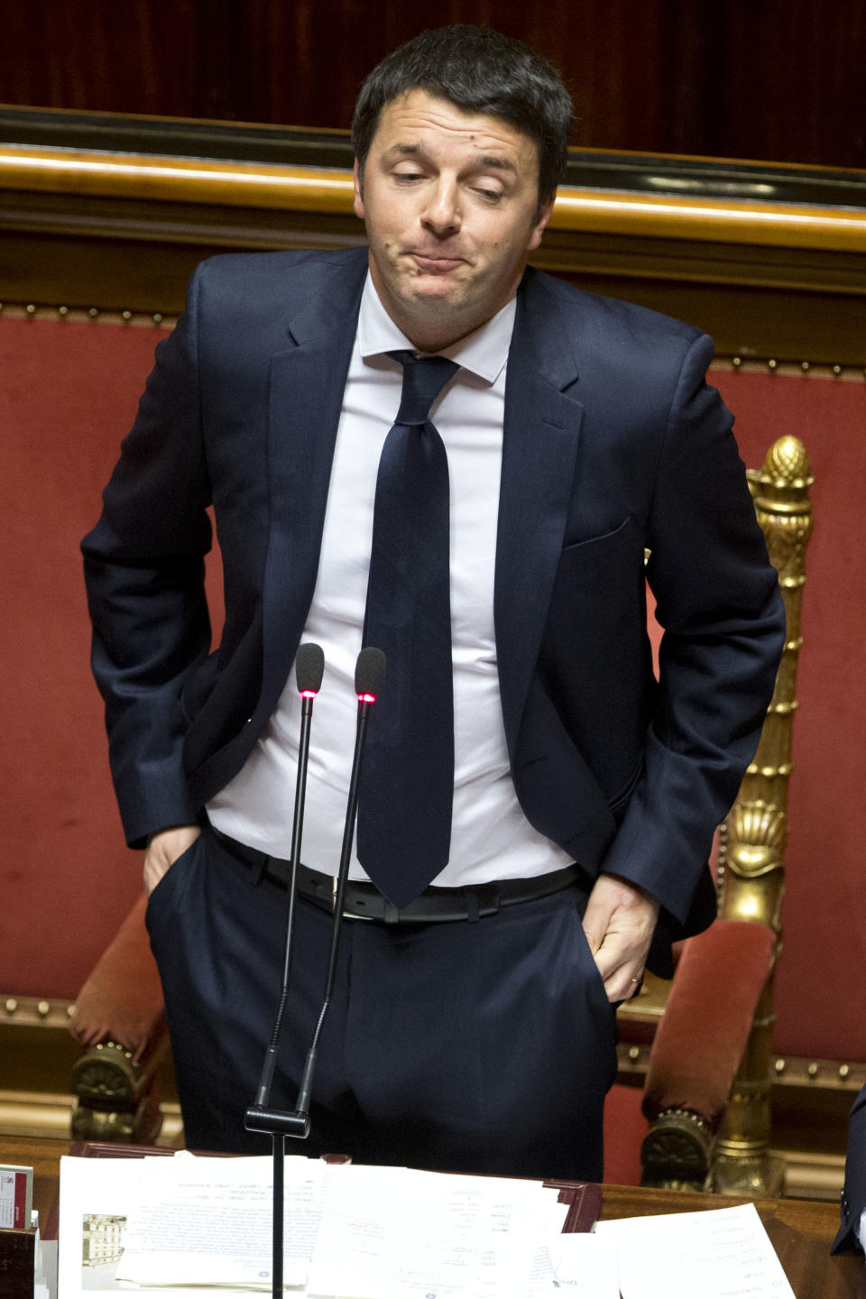 Premier Matteo Renzi delivers his speech prior to a confidence vote, at the Senate, in Rome, Monday, Feb. 24, 2014. Renzi, Italy's youngest premier, is heading a new government he says promises will swiftly tackle old problems.(AP Photo/Andrew Medichini)