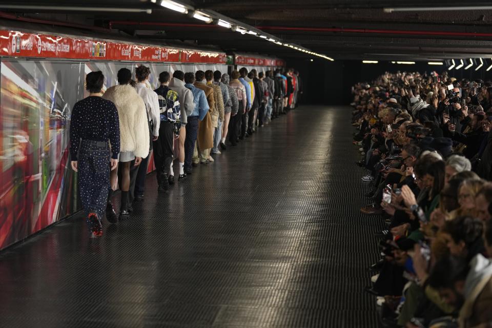 Models wear creations as part of the men's MSGM Fall-Winter 2024-2025 collection, that was presented in Milan, Italy, Saturday, Jan. 13, 2024. (AP Photo/Antonio Calanni).