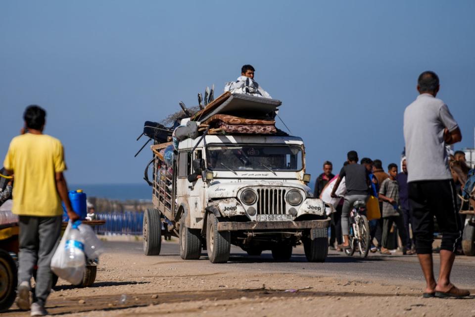 Displaced Palestinians arrive in central Gaza after fleeing from the southern Gaza city of Rafah in Deir al Balah, Gaza Strip, on Wednesday, May 7, 2024. (AP)