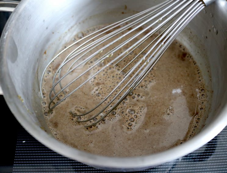 Whisk the ingredients while heating