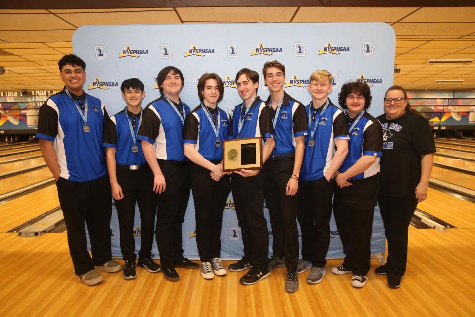 The Pearl River boys bowling team poses with its runner-up plaque after the Section 1 boys bowling championship on February 14, 2024.