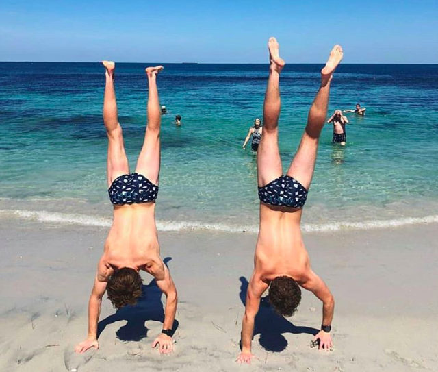Many were head over heels with the warm weather in Perth on Saturday, including this pair at Cottesloe Beach. Source: Instagram/ nut.huggerz