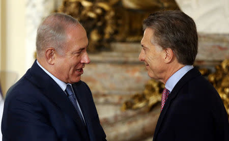 Israeli Prime Minister Benjamin Netanyahu and Argentina's President Mauricio Macri talk during a ceremony at the Casa Rosada Presidential Palace in Buenos Aires, Argentina September 12, 2017. REUTERS/Marcos Brindicci