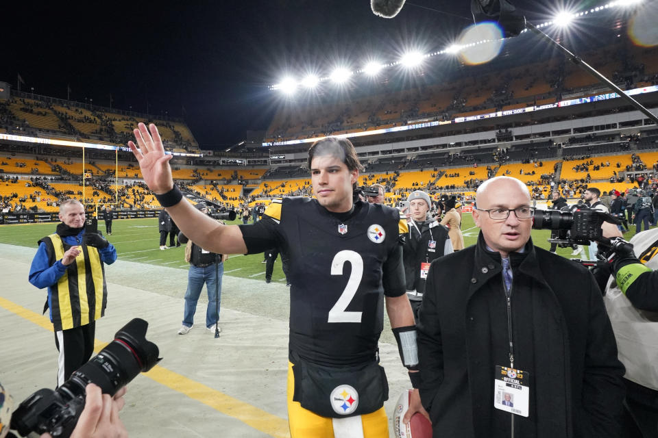 Pittsburgh Steelers quarterback Mason Rudolph (2) waves as he walks off the field after an NFL football game against the Cincinnati Bengals, Saturday, Dec. 23, 2023, in Pittsburgh. The Steelers won 34-11. (AP Photo/Gene J. Puskar)